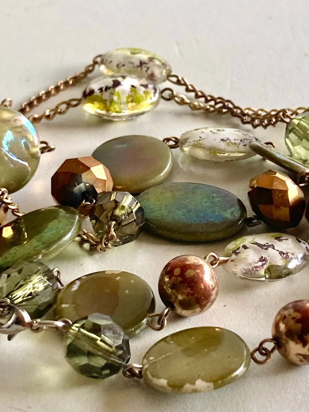 Gold and silver tone Chain Necklace with Light Green Beads signed EL